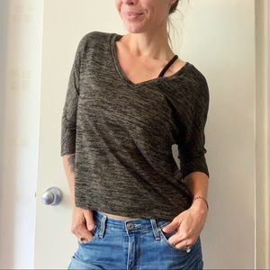 Casual black and green top with 3/4 length sleeves